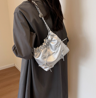 Sleek Silver Bow Clutch