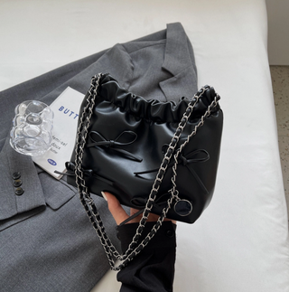 Sleek Black Bow Clutch